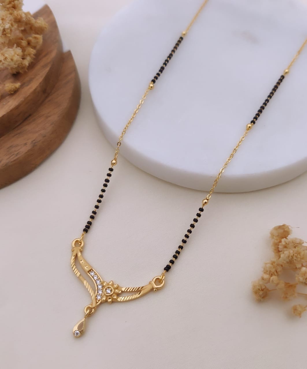 Vritika Crystal Curve Black Bead Mangalsutra