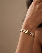 Elara Interlock Gold-Tone Open Cuff Bracelet