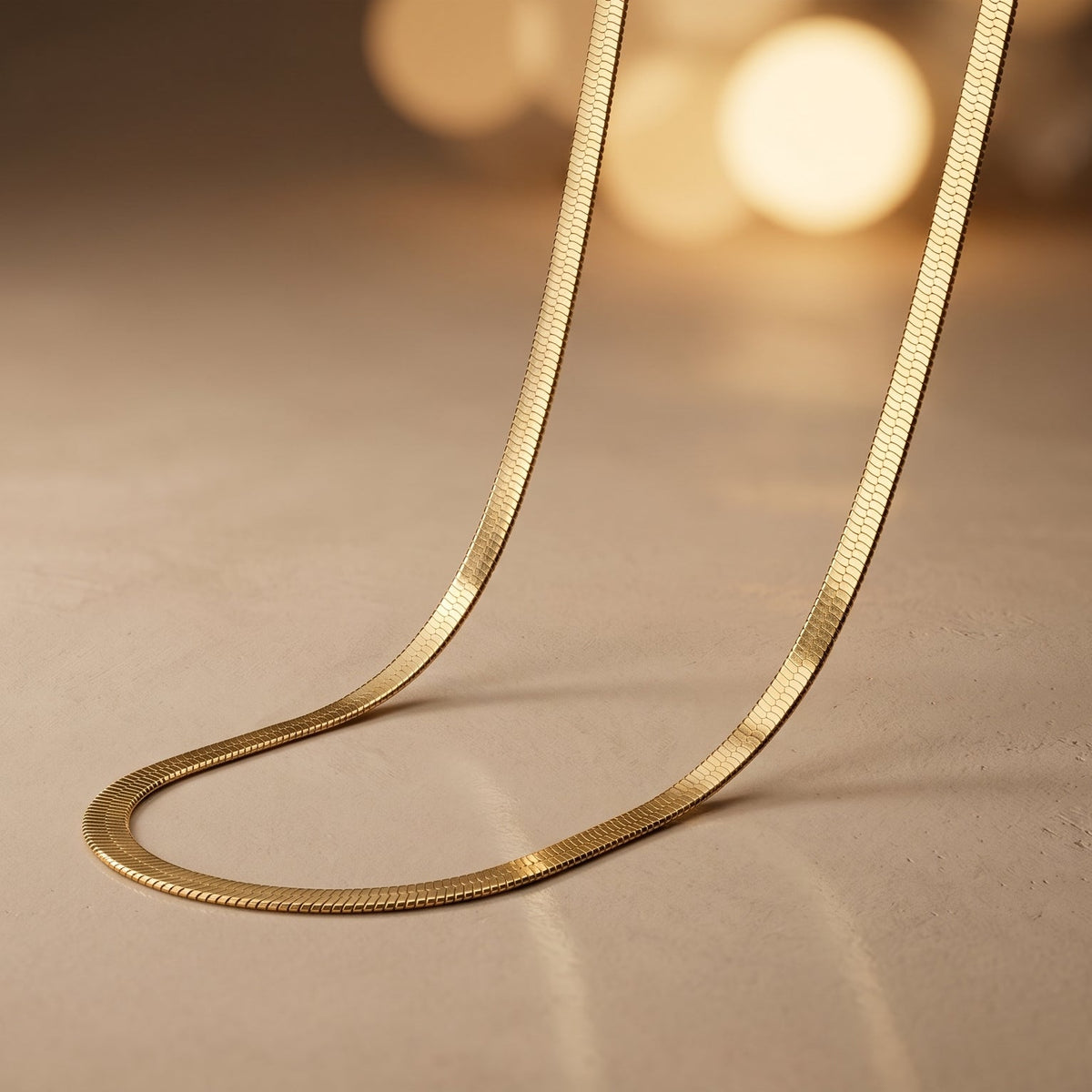 Sleek Gold-Tone Herringbone Chain