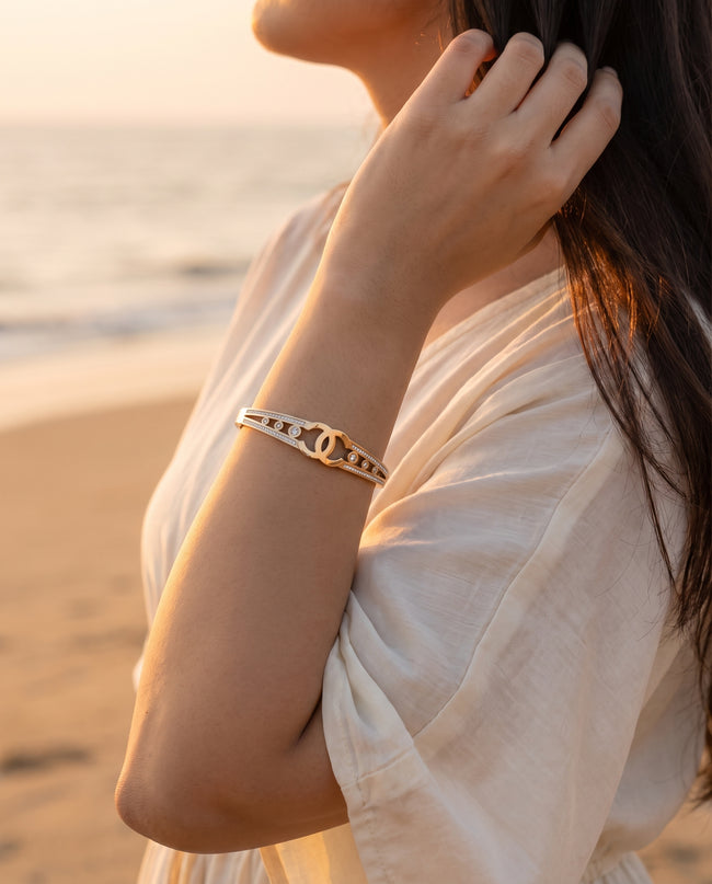 Elara Interlock Gold-Tone Open Cuff Bracelet Main Image